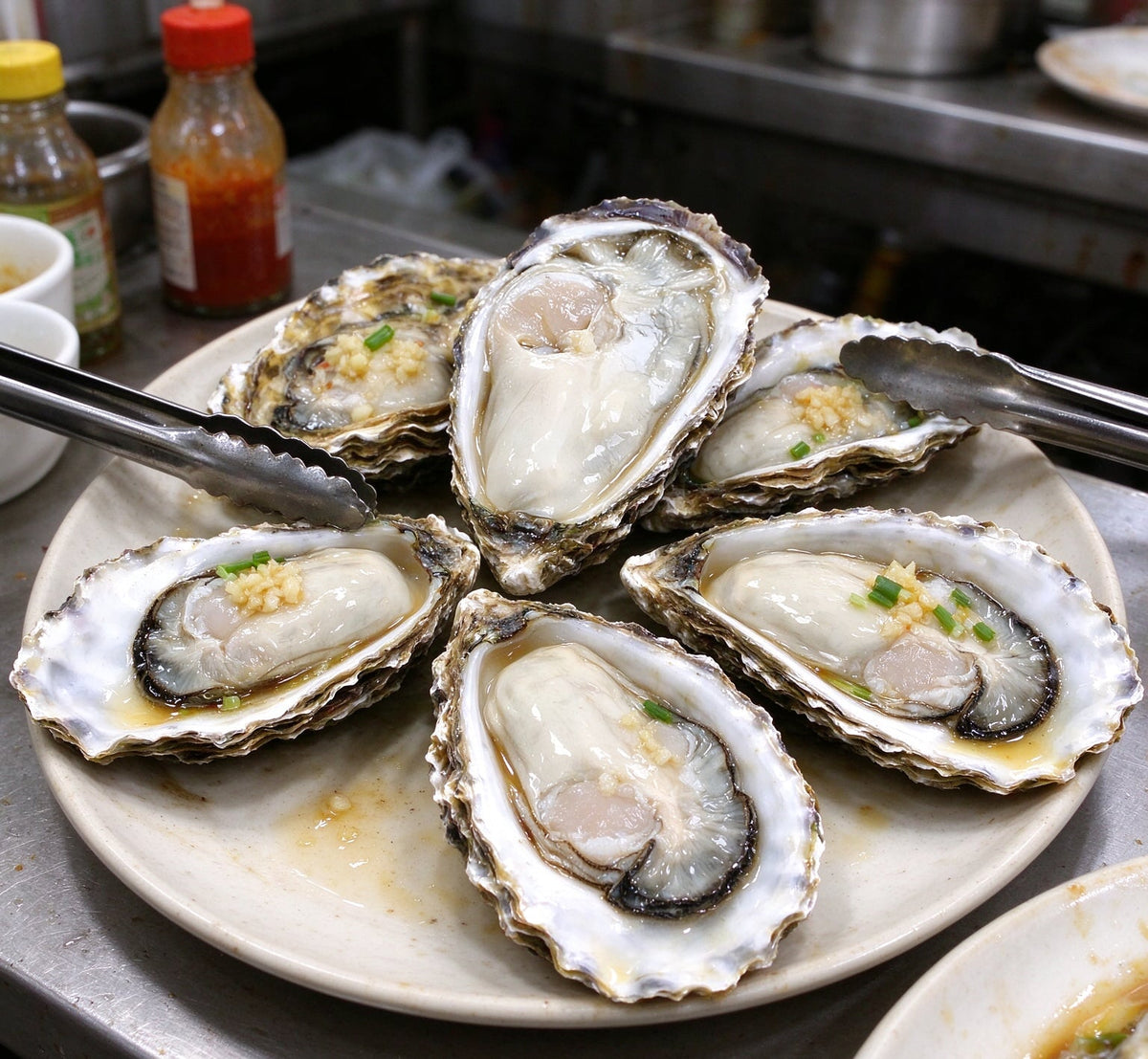 Fresh raw oysters in the shell, arranged in a bowl (3)